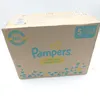 A cardboard box of Pampers diapers. Podgląd zdjęcia produktu