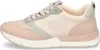 A side view of a single women's sneaker. Voir les images du produit