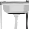A close-up view of a stainless steel sink and its drainpipe. Podgląd zdjęcia produktu