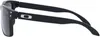Side view of a pair of black Oakley sunglasses. Náhled obrázku produktu