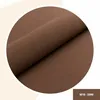 A close-up shot of a brown fabric, folded to show its texture. Anteprima dell’immagine prodotto