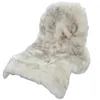 A single sheepskin rug is shown against a white background. Produktbild-Vorschau