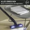 A vacuum cleaner head with LED lights is shown on a floor, with a table and books in the background. Produktbild-Vorschau