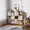 A living room scene with a bookshelf, a robot vacuum, and a sofa. Produktbild-Vorschau