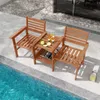 A wooden patio set with two chairs and a table sits next to a swimming pool. Náhľad obrázku produktu