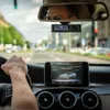 View from inside a car looking at the dashboard and the road ahead. Produktbild-Vorschau