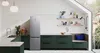 A modern kitchen with a Samsung refrigerator, dark green cabinets, and a built-in bench. Náhled obrázku produktu