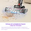 A vacuum cleaner head is shown cleaning up debris from a floor. Produktbild-Vorschau
