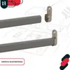 A product image showing a gray clothes rail with mounting brackets against a blueprint background of a house. Náhľad obrázku produktu