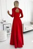 A woman wearing a red dress in a modern interior setting. Produktbild-Vorschau
