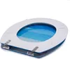 A toilet seat with a beach scene printed on it. Produktbild-Vorschau