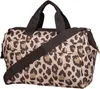 A studio shot of a duffel bag with a leopard print. Produktbild-Vorschau