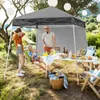 People enjoying a picnic under a canopy. Náhľad obrázku produktu
