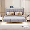 A modern bedroom with a grey upholstered bed featuring LED lighting and a floating frame. Produktbild-Vorschau