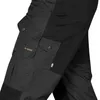 A close-up view of the cargo pockets and fabric details of black outdoor trousers. Produktbild-Vorschau