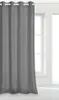 A gray curtain hangs in front of a window. Produktbild-Vorschau