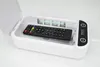 A white UV sterilizer box with a remote control inside, showing the UV lights. Produktbild-Vorschau