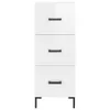 A white, three-drawer cabinet with black handles and black legs, shown against a white background. Náhľad obrázku produktu