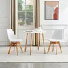 A dining set with two chairs and a table in a room with a window and curtains. Voir les images du produit