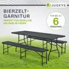A table and two benches set up on a grassy lawn, with marketing text and a logo. Produktbild-Vorschau