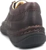 A close-up, rear-facing view of a brown leather shoe. Anteprima dell’immagine prodotto