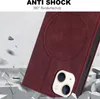 A close-up of a red iPhone case with a circular MagSafe imprint, shown against a background of broken concrete and debris, suggesting shock absorption. Produktbild-Vorschau