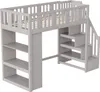 A loft bed with stairs and shelves, shown from a slightly elevated side angle against a white background. Náhled obrázku produktu