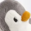 A close-up shot of a plush penguin toy. Produktbild-Vorschau