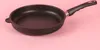 A black frying pan with a black handle is shown on a pink background. Náhľad obrázku produktu