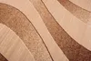 A close-up view of a carpet with a wavy pattern in beige and brown tones. Produktbild-Vorschau
