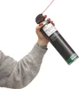 A person's arm and hand holding a can of compressed air. Produktbild-Vorschau