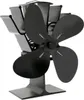 A black stove fan with four blades on a white background. Podgląd zdjęcia produktu