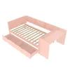 A 3D rendering of a pink children's bed with drawers, a slatted base, and a desk attachment, shown against a white background. Náhľad obrázku produktu