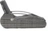 A side view of a gray wicker lounger with a gray cushion. Produktbild-Vorschau