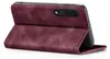 A burgundy flip case for a smartphone is shown from the side, with the phone inserted and the cover folded open. Produktbild-Vorschau