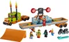 A LEGO City stunt show truck with a trailer, ramp, motorcycle, and figures, displayed on a white background. Produktbild-Vorschau