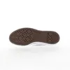 The sole of a Converse All Star shoe is shown against a white background. Voir les images du produit