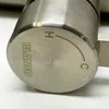 A close-up of a brushed stainless steel faucet handle with 'BLANCO' engraved on it, and indicators for hot 'H' and cold 'C'. Produktbild-Vorschau