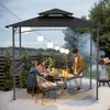 People are gathered around a table under a black gazebo, enjoying a meal and a barbecue. Voir les images du produit