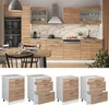 A kitchen scene with cabinets, appliances, and a dining table, followed by a separate display of kitchen cabinet drawer units. Produktbild-Vorschau