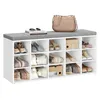A white shoe rack with a gray cushion on top, filled with various shoes and two boxes. Produktbild-Vorschau