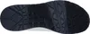 The sole of a white and black SKECHERS UNO women's sports shoe is shown from an underneath view against a white background. Voir les images du produit