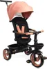 A studio shot of a pink and black toddler tricycle. Produktbild-Vorschau