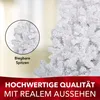 A close-up of a white artificial Christmas tree with text overlays highlighting its features and quality. Produktbild-Vorschau