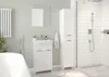 A clean, modern bathroom featuring a white vanity with a sink and faucet, a tall white storage cabinet, and a tiled shower area. Podgląd zdjęcia produktu
