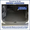 The interior of a car trunk with a carpeted floor. Produktbild-Vorschau