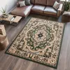 A living room scene with a sectional sofa, coffee table, and a rug.