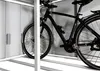 A black bicycle is stored inside a light gray metal storage unit. Anteprima dell’immagine prodotto