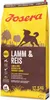 A bag of dog food with a graphic of a dog and people in a field. Produktbild-Vorschau