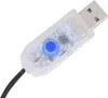A close-up of a USB cable with a blue button and a USB connector. Náhled obrázku produktu